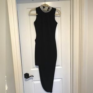 Medium black cocktail dress with jeweled neck line
